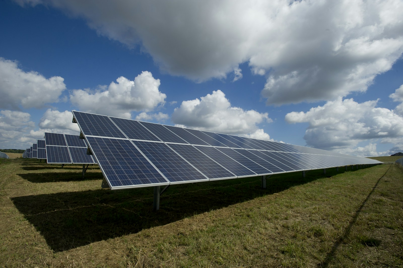 Rows of solar panels at a solar energy installation